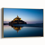 Framed canvas depicting a vintage-style landscape of a French scene in muted gold and black tones.