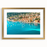 Abstract art print of Nice, France, in muted blue and gold tones, framed with a gold mat, ideal for dining room decor.