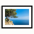 Abstract art print of Provence scenery in vibrant colors on a large, textured canvas, framed in black.