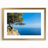 Abstract art print of Provence scenery in muted earth tones on a gold-framed canvas, suitable for dining room decor.