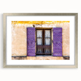 Extra large abstract art print of a textured European scenery in muted earth tones, framed in silver.