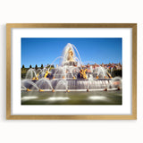 Abstract art print of Versailles scenery in muted gold and beige tones, framed with a mat, suitable for dining room decor.