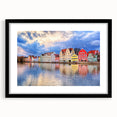 Extra large colorful art print of abstract Munich scenery on textured canvas, framed in black, ideal for living room decor.