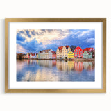 Abstract art print of Munich skyline in gold frame, featuring muted blue and gray tones, ideal for dining room decor.