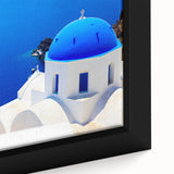 Black and white framed canvas of Santorini landscape, ideal for bedroom wall decor.