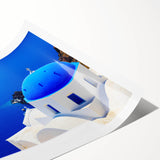 Extra large wall art of Santorini scenery, featuring white buildings and blue domes, printed on rolled canvas.