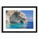 Abstract art print of a vibrant, colorful Greek landscape on a large, textured canvas, framed in black.