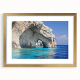 Abstract art print of a Greek landscape in muted blue and white tones, framed in gold, ideal for dining room decor.