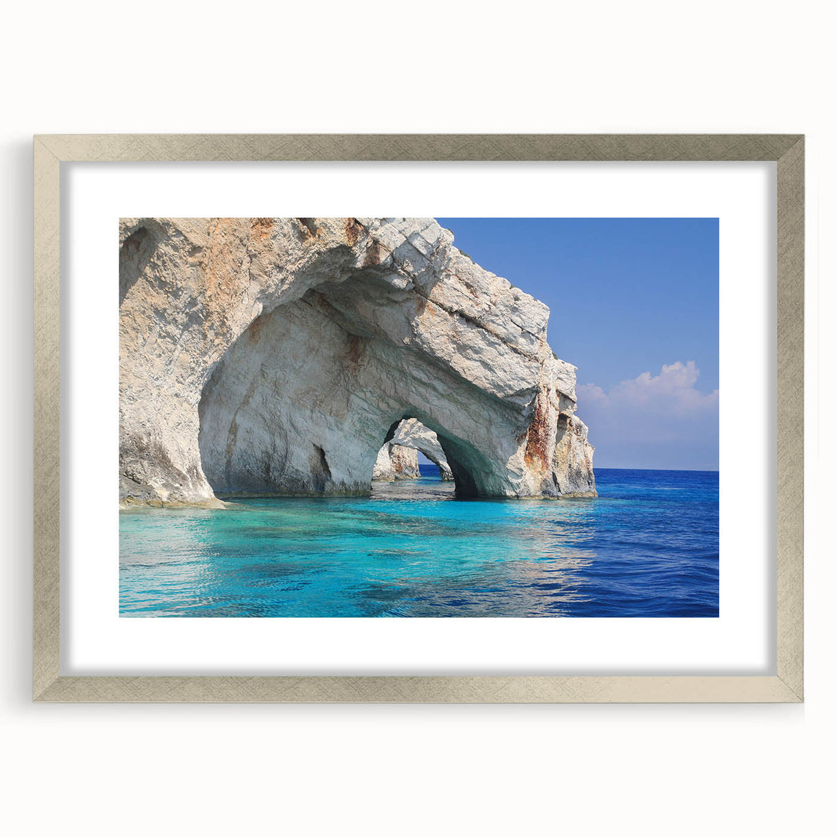 Extra large abstract art print of a textured European scenery, in muted earth tones, framed in silver.