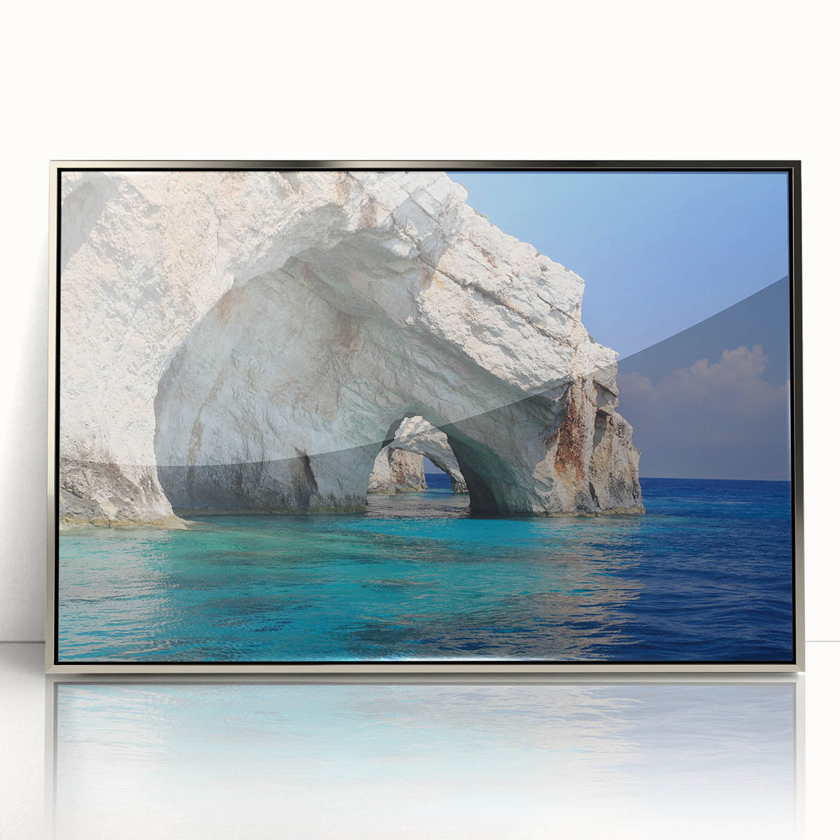 Acrylic print of a Greek landscape in muted earth tones, framed in silver, suitable for modern art wall decor.