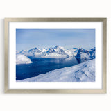 Extra large abstract art print of a textured Greenland scenery in muted green and blue tones, framed with a silver mat.