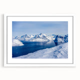 Textured abstract art print of a Greenlandic landscape in muted green and blue tones, framed with a white mat.