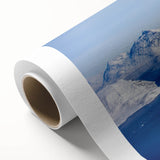 Art deco poster of Greenland scenery on rolled canvas, featuring muted green and blue tones, ideal for nursery wall art.