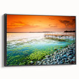 Black and white framed canvas featuring a vintage landscape painting of a European scene, ideal for bedroom decor.