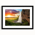 Extra large abstract art print of a colorful Icelandic landscape on a textured canvas, framed in black.