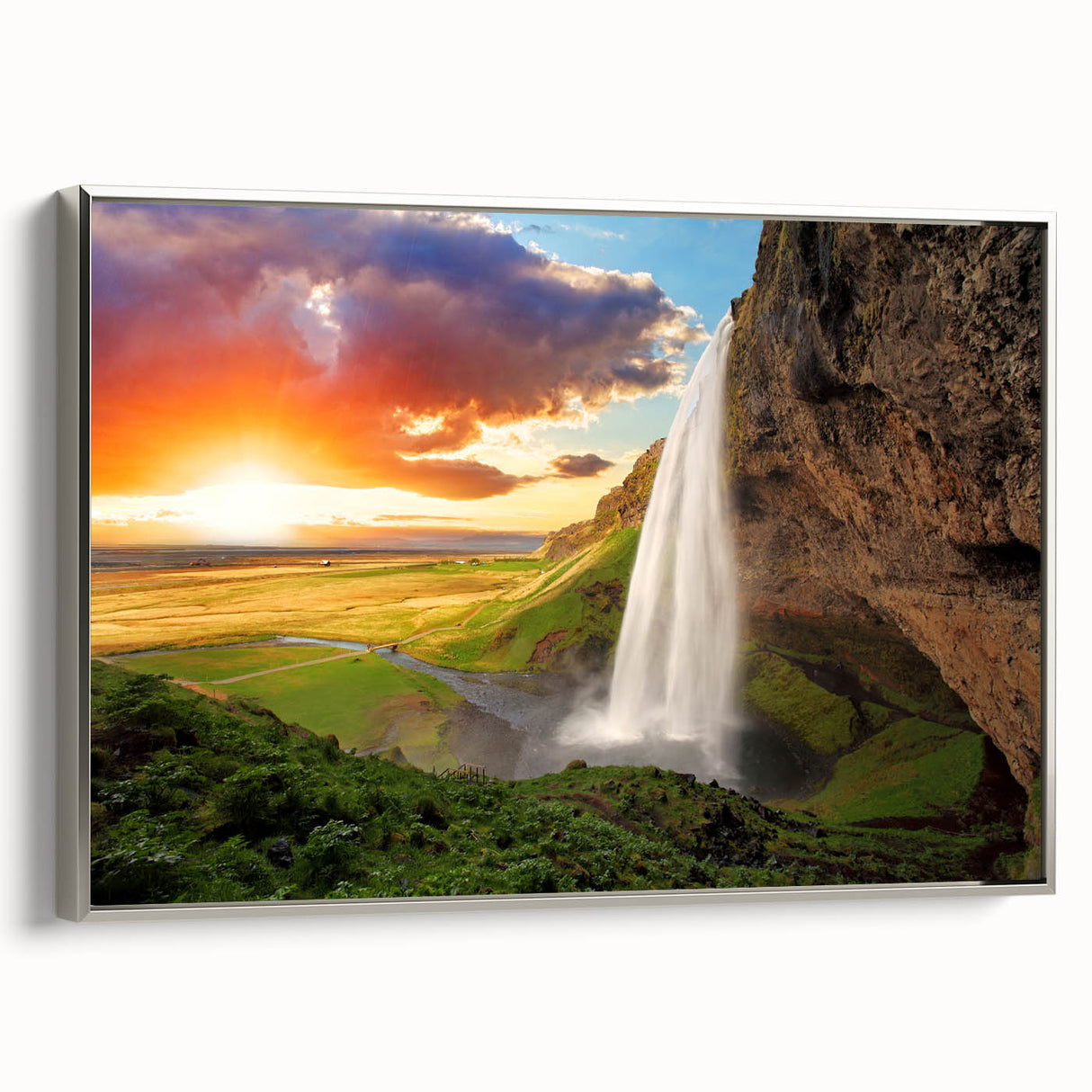 Framed canvas of a vintage-style Icelandic landscape painting with muted shades of black and colorful highlights.