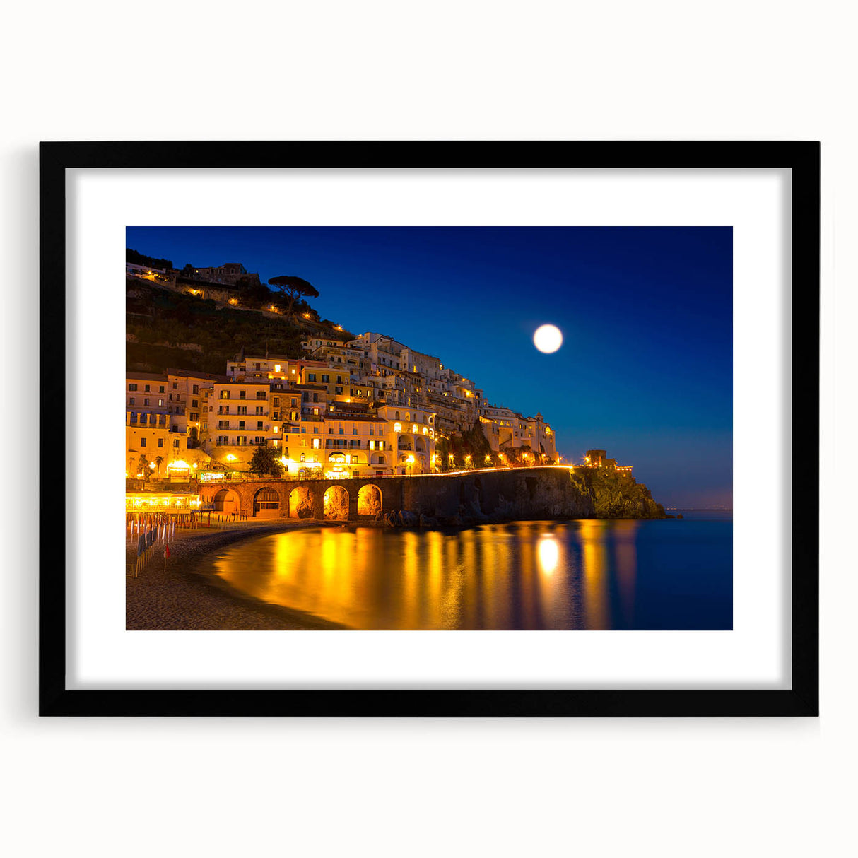 Colorful abstract art print of the Amalfi Coast in vibrant hues on a large framed canvas, ideal for living room decor.