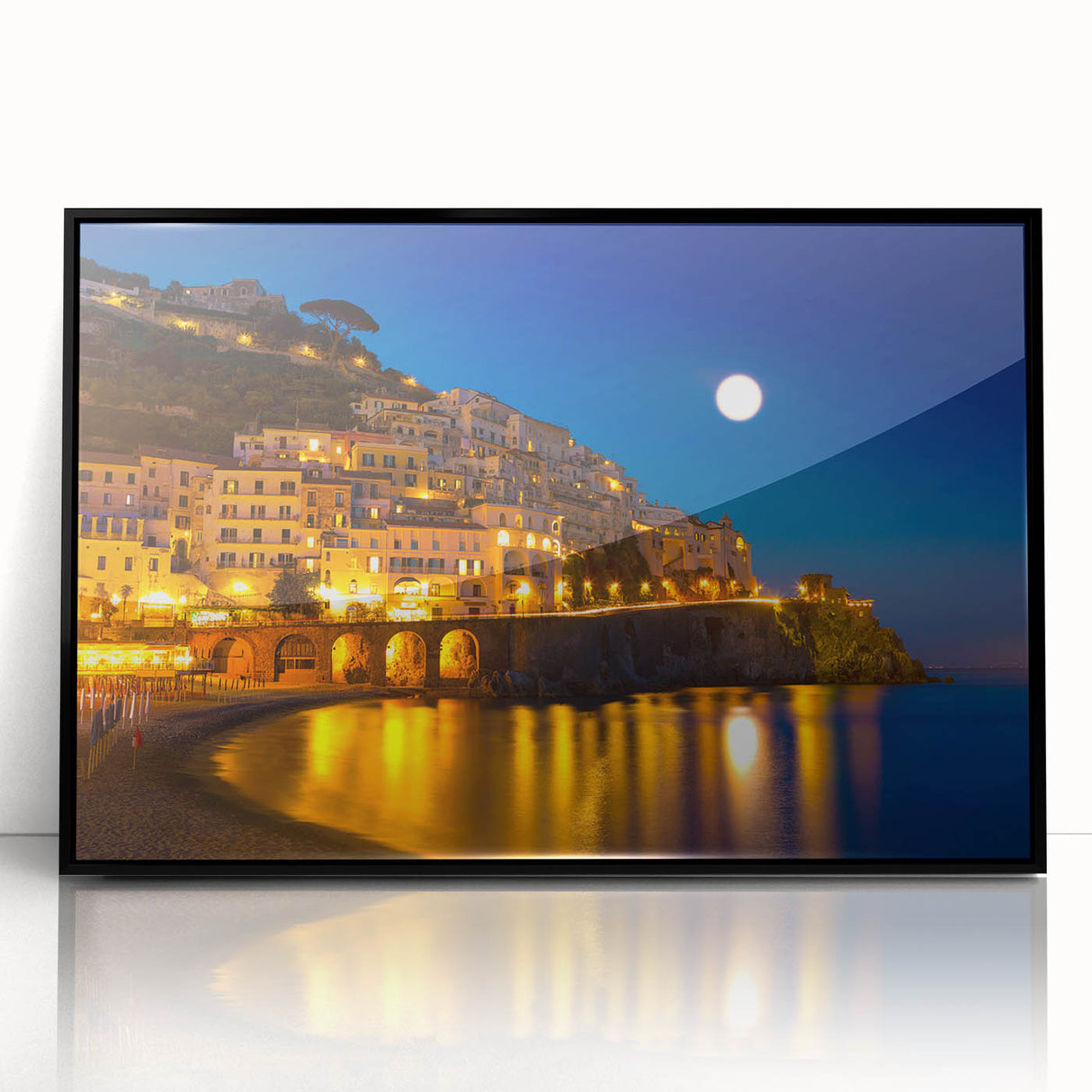 Large abstract wall art depicting the Amalfi Coast in muted blue and green tones on a framed acrylic print.