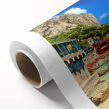 Art Deco-style poster of Capri, Italy, showcasing pastel-colored buildings and sea, on rolled canvas.