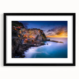 Colorful art of Cinque Terre with abstract prints in vibrant hues on a large framed canvas, ideal for living room decor.