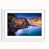 Textured abstract art print of Cinque Terre with vivid blue and green hues on a white framed canvas.