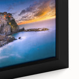 Framed canvas featuring a textured image of Cinque Terre in vibrant colors, ideal for living room decor.