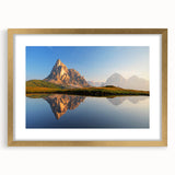 Abstract art print of the Dolomites in Italy, featuring muted earth tones on a framed canvas, ideal for dining room decor.