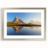 Extra large wall art of abstract Dolomites scenery in textured hues of blue and gray, framed in silver.