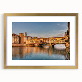 Abstract art print of Florence with gold frame and mat, featuring muted earth tones, ideal for dining room decor.
