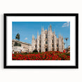 Abstract art print of Milan scenery in vibrant, colorful hues on a large textured canvas, framed in black.