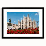 Abstract art print of Milan scenery in vibrant, colorful hues on a large textured canvas, framed in black.