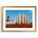 Abstract art print of Milan scenery in muted gold and ivory tones, framed with a gold mat, suitable for dining room decor.