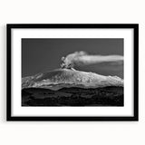 Extra large abstract art print of Mount Etna with vibrant, textured colors on a framed black mat.