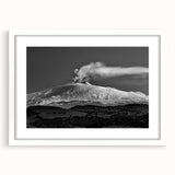 Textured abstract art print of Mount Etna, in muted earth tones on a framed white canvas, suitable for bedroom decor.