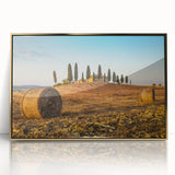 Framed acrylic print of a Tuscan landscape in muted earth tones, ideal for modern art wall decor in a nursery.