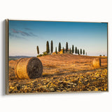 Vintage poster art of a Tuscan landscape on framed canvas, featuring vibrant green and gold tones.