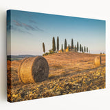 Tuscan landscape with rolling hills and a sunset, rendered in warm earth tones on a large stretched canvas.