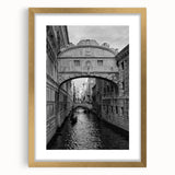 Abstract art print of Venice with muted gold and blue tones on a framed canvas, suitable for bedroom or dining room decor.