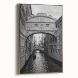Framed canvas of a vintage-style Venice landscape in muted gold and black tones, ideal for bedroom wall decor.