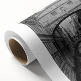 Art Deco style poster of Venice scenery on rolled canvas, featuring muted blue and peach tones.