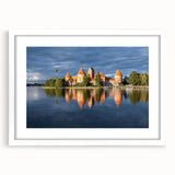 Textured abstract art print of a European scenery in muted earth tones on a framed white mat, ideal for bedroom art.