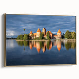 Framed canvas featuring a vintage-style landscape painting of a Lithuanian scenery in muted earth tones.