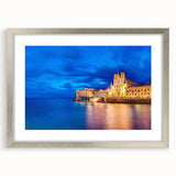 Extra large abstract art print of a textured European scenery in muted earth tones, framed in silver.