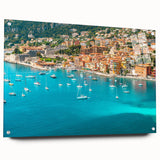 Acrylic glass wall art depicting a scenic Monaco landscape in vibrant blue and green hues.