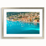 Extra large wall art depicting an abstract European Monaco scenery in muted blue and gray tones, framed in silver.
