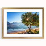 Abstract art print of a European Montenegro scenery in muted earth tones, framed in gold.