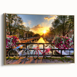 Framed canvas of a vintage Amsterdam landscape in black and gold tones, suitable for bedroom decor.