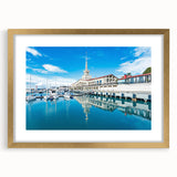 Abstract art print of Sochi landscape in muted gold and blue tones on a framed canvas, ideal for dining room decor.