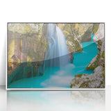 Large art print of a Slovenian landscape in muted green and blue tones, framed in white acrylic.