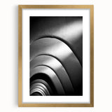 Abstract art print of Barcelona skyline in muted gold and blue tones on a framed canvas, ideal for dining room decor.